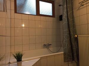 Koupelna v ubytování Petites-Tailles - chambre d'hôtes + 27 fotografií