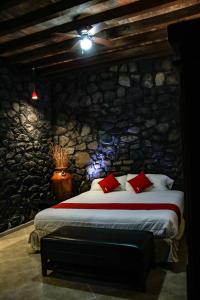 Postel nebo postele na pokoji v ubytování Hotel Boutique Don Porfirio