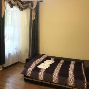 En eller flere senge i et værelse på У Богдана