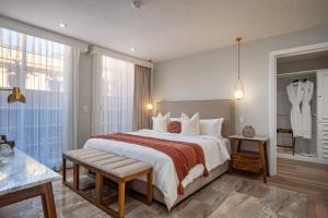 Cama o camas de una habitación en Hotel Casa Arum