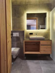 Kúpeľňa v ubytovaní Sun Lodge