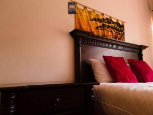Cama ou camas em um quarto em The Haven Guest House