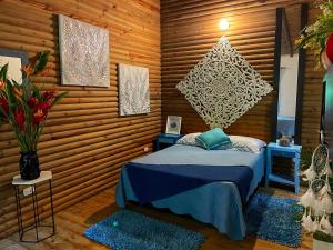 Postel nebo postele na pokoji v ubytování La Nube Eco-Hotel