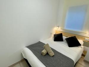 A bed or beds in a room at PROBER_ENCAMP
