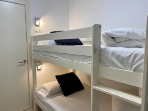 A bed or beds in a room at PROBER_ENCAMP