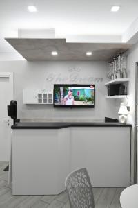 A kitchen or kitchenette at B&B The Dream