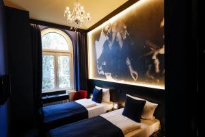Ein Bett oder Betten in einem Zimmer der Unterkunft Sleephotels Casino