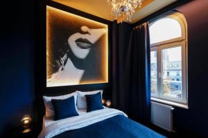 Ein Bett oder Betten in einem Zimmer der Unterkunft Sleephotels Casino