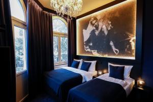 Säng eller sängar i ett rum på Sleephotels Casino