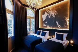 Ein Bett oder Betten in einem Zimmer der Unterkunft Sleephotels Casino
