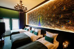 Ein Bett oder Betten in einem Zimmer der Unterkunft Sleephotels Casino
