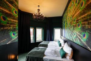 Ein Bett oder Betten in einem Zimmer der Unterkunft Sleephotels Casino