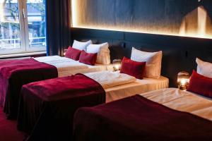 Postel nebo postele na pokoji v ubytování Sleephotels Casino + 30 fotografií