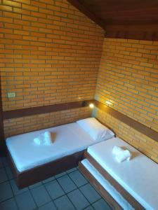 Кровать или кровати в номере Condomínio Vereda Tropical - Casa 2 +4 фотографии