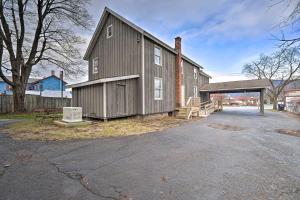 a large wooden building with a ramp next to it at Family-Friendly Retreat Less Than 1 Mi to Lake George in Lake George