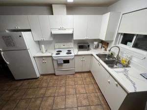 Kuchyň nebo kuchyňský kout v ubytování Bear Creek Suite