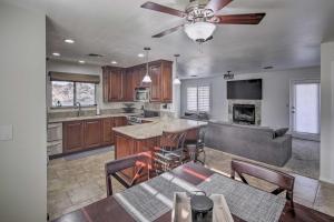 a kitchen with a couch and a table with chairs at Parker Home on the Colorado River with Views! in Parker