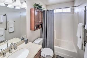 a bathroom with a sink and a toilet and a shower at Parker Home on the Colorado River with Views! in Parker +21 photos