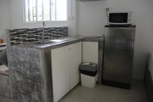 Kuchyň nebo kuchyňský kout v ubytování Samui Beach Residence Hotel