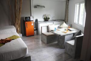 Postel nebo postele na pokoji v ubytování Samui Beach Residence Hotel