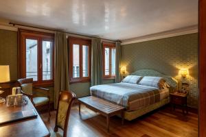 Postel nebo postele na pokoji v ubytování Hotel Montecarlo + 37 fotografií
