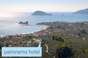 an island in the ocean with a sign that reads panama hotel at Panorama in Laganas