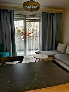 A seating area at Uroczy Apartament z Garażem
