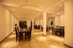 Ресторант или друго място за хранене в Olu villa Resort