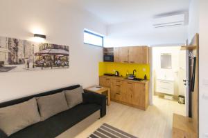 Kuchyň nebo kuchyňský kout v ubytování Hotel Konopielka