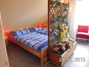 Postel nebo postele na pokoji v ubytování Gästehaus Auhagen