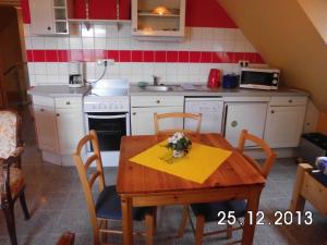 Kuchyň nebo kuchyňský kout v ubytování Gästehaus Auhagen