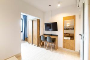 TV a/nebo společenská místnost v ubytování Hotel Konopielka