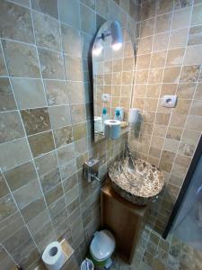 Koupelna v ubytování Ra's Studio