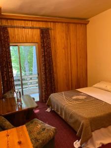 Postel nebo postele na pokoji v ubytování Tamerland-faraya