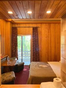 Postel nebo postele na pokoji v ubytování Tamerland-faraya