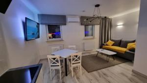 Μια τηλεόραση ή/και κέντρο ψυχαγωγίας στο Apartamenty Rynek 21