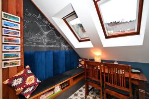 a childs room with a chalkboard on the wall at Pokoje na Jasnej in Szczyrk