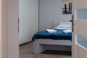 Posteľ alebo postele v izbe v ubytovaní Sopot Host Garden