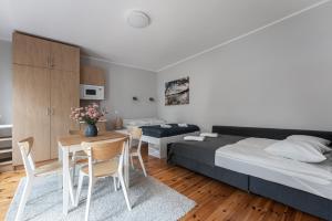 Posteľ alebo postele v izbe v ubytovaní Sopot Host Garden