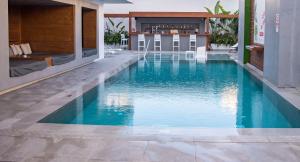 
The swimming pool at or near Manousos City Hotel
