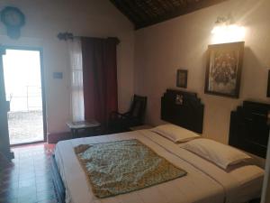 Postel nebo postele na pokoji v ubytování Indeco Hotels Swamimalai