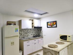 Η κουζίνα ή μικρή κουζίνα στο Apartamento Descanso Central