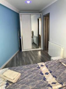 Postel nebo postele na pokoji v ubytování New Gudauri Twins