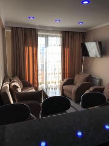 Posezení v ubytování New Gudauri Twins + 8 fotografií