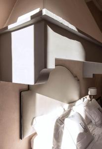 Кровать или кровати в номере Relais Uffizi