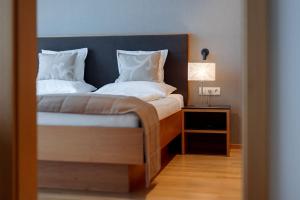 Posteľ alebo postele v izbe v ubytovaní Schneeglöckle Appartements