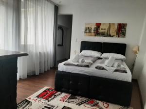 Ένα ή περισσότερα κρεβάτια σε δωμάτιο στο Green Garden Zvonex Tuzla