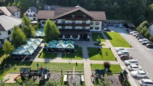 an aerial view of a building with a parking lot at Brandeberg Pension & Restaurant in Bran