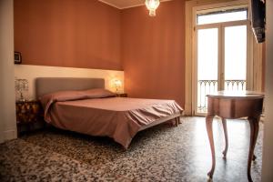 A bed or beds in a room at U'Panare