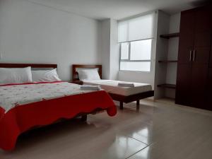 Postel nebo postele na pokoji v ubytování Hotel Prestigio JC